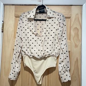 Kittenish Darla cream bodysuit with black hearts